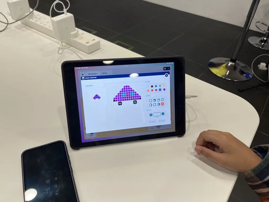 A student designing a model with Wonderland’s Voxel Creator on an iPad